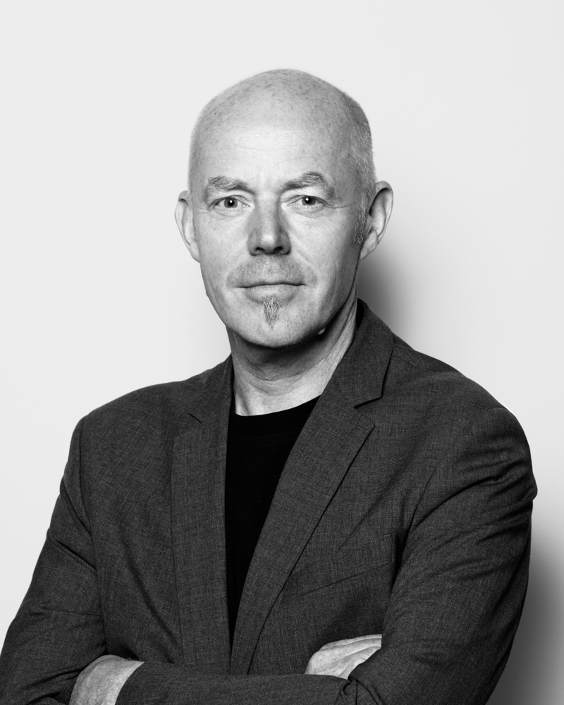 Svart/hvitt portrett av Ole Gustavsen.