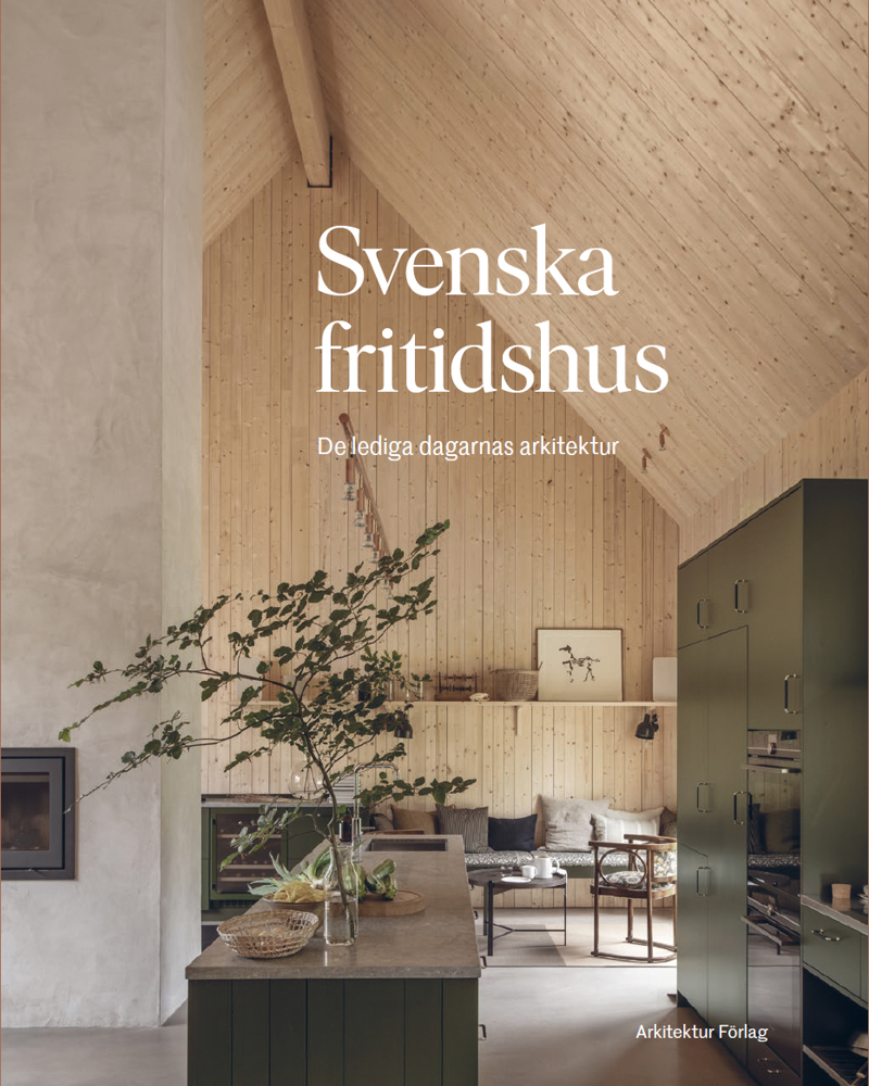Forside på bok, interiør foto av hytte.