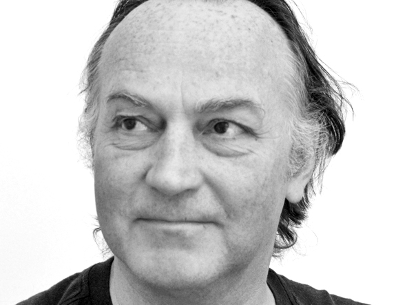 Portrettbilde av Nils Mannsaker i svart hvitt. Foto.