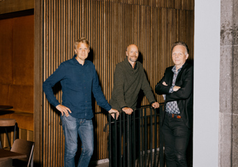 Foto av tre menn.