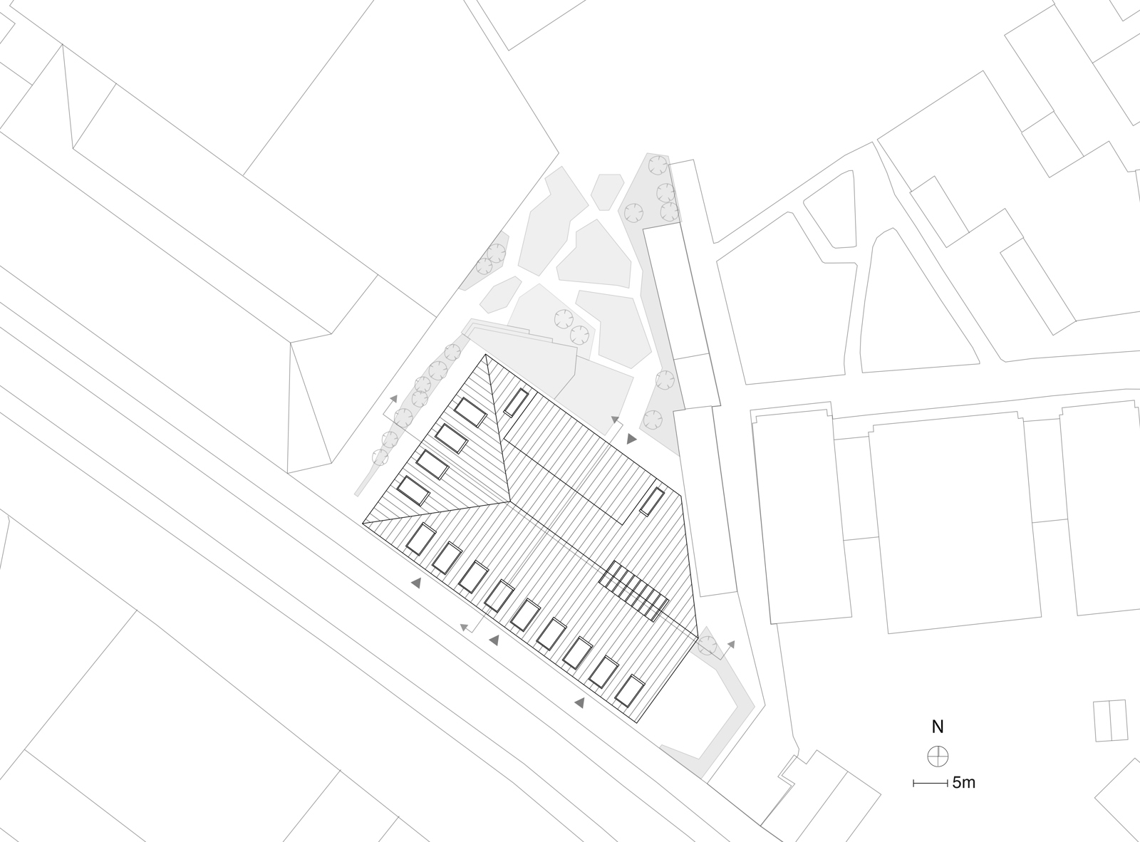 Situasjonsplan som viser et bygg i omliggende bykontekst.