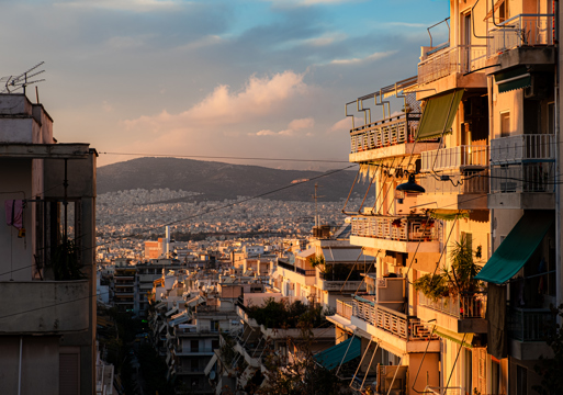 Foto av Athen i solnedgang.