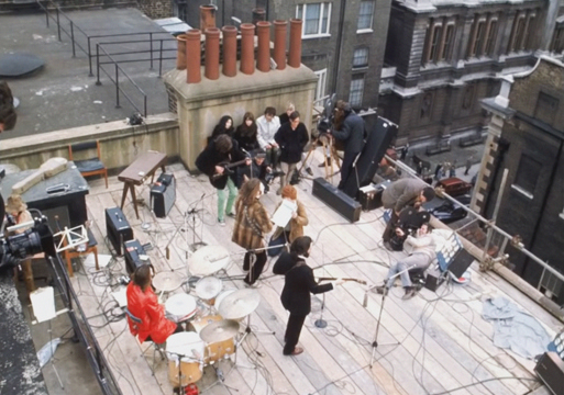 The Beatles spiller konsert på et tak i London. Foto.