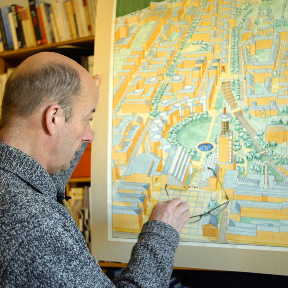 Foto av den svenske arkitekten og byplanleggeren Jan Inghe peke på en byplan.
